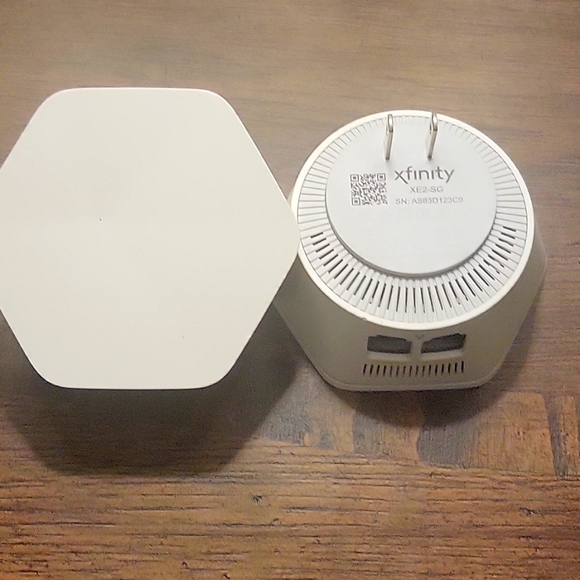 Xfinity WiFi pod extender (2) - Picture 1 of 2